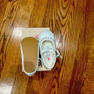 Baby white shoes never worn